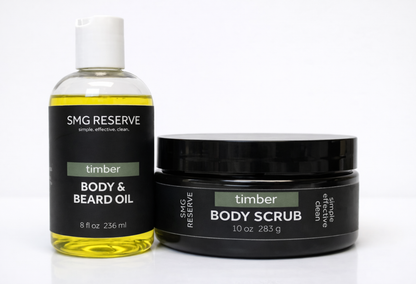 SMG Reserve Timber body scrub and body and beard oil shown side by side on a white background, featuring a men’s exfoliating scrub and lightweight grooming oil