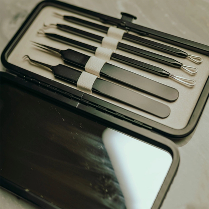 Pete & Pedro acne and blackhead remover tools secured inside compact leather carrying case