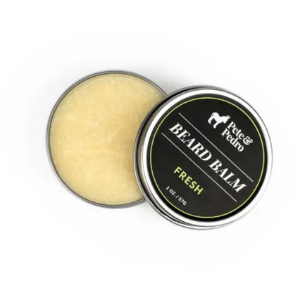 Open tin of Pete & Pedro Fresh beard balm showing smooth balm texture inside