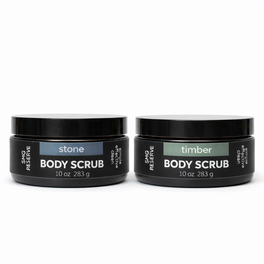 SMG Reserve body scrub jars in Stone and Timber scents, 10 oz black jars on a white background